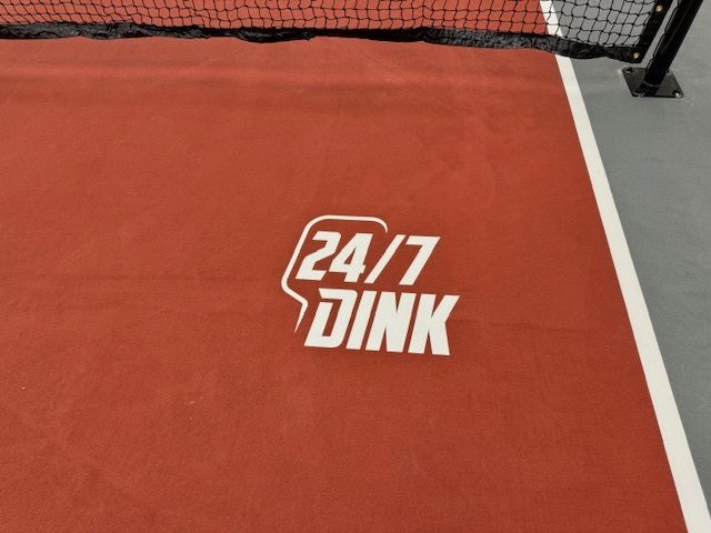 24/7 Dink Logo painted on pickleball court