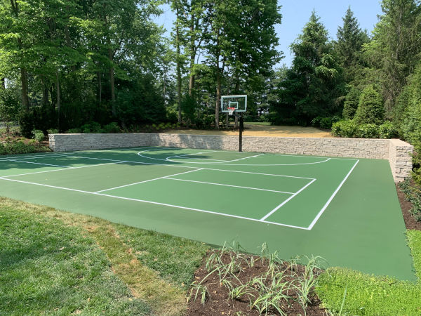 Backyard basketball and pickleball court