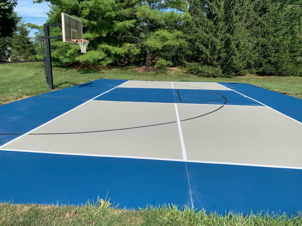 backyard pickleball court and basketball court