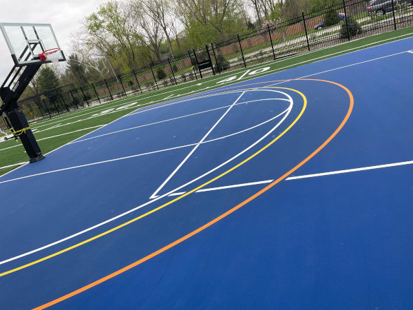 New basketball court installed in a city park.