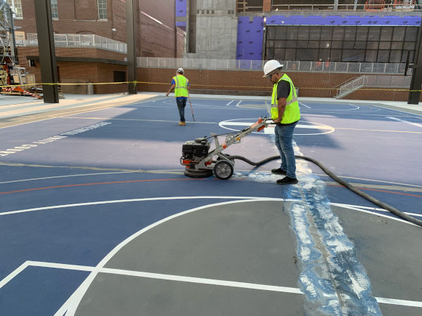 basketball court being prepped for resurfacing