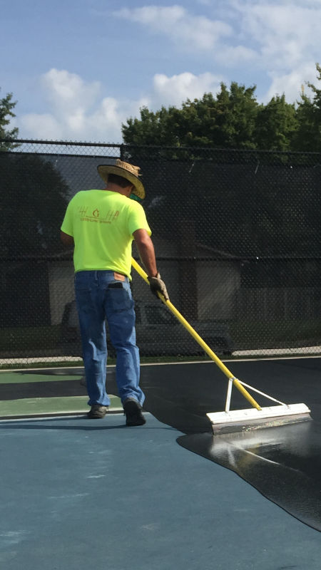 first coat of coating be applied to tennis court