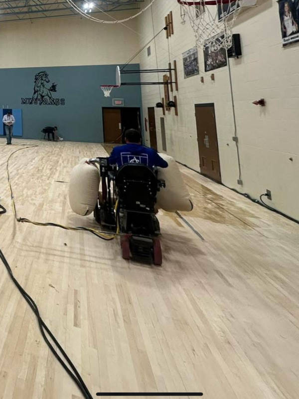 Hardwood floor being sanded
