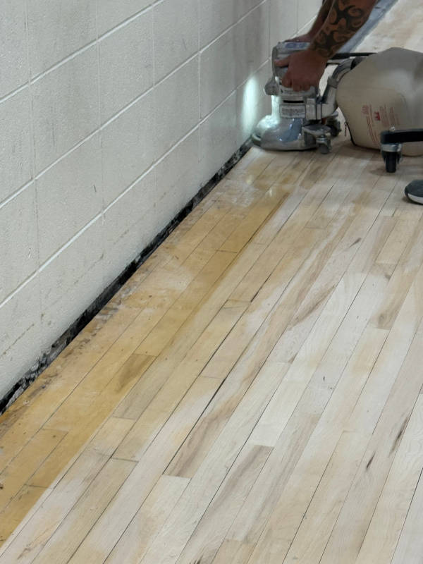 edge sanding hardwood gym floor