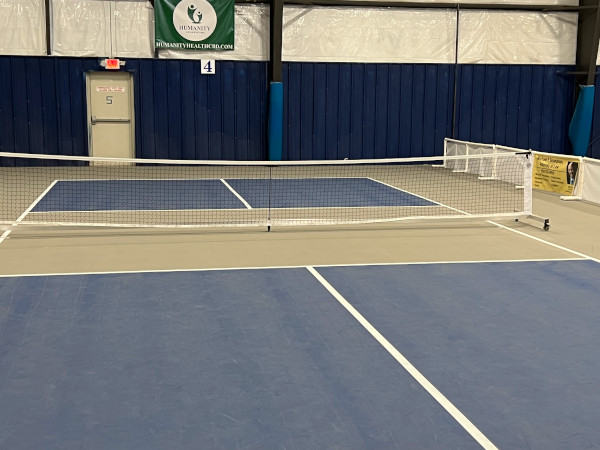 temporary pickleball court in building